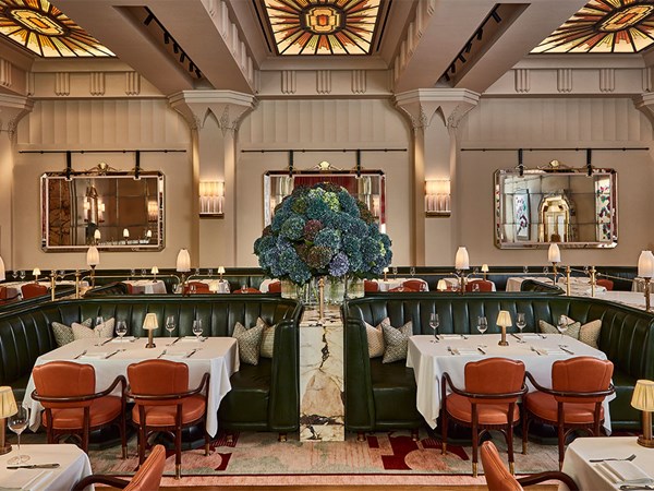 Claridge's Restaurant room with beautiful flowers and table dressed up.